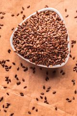 Flax seeds linseed in white bowl