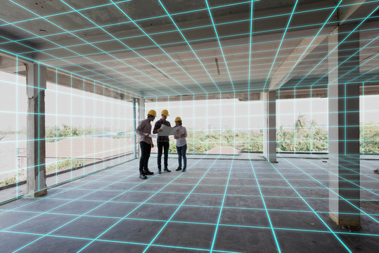 Three construction engineer discuss inside building, plan for renovation with 3d digital layout