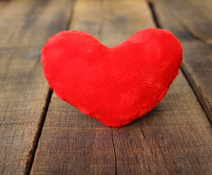 Heart on wood in love.