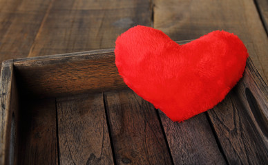 Naklejka premium Heart on wood in love.