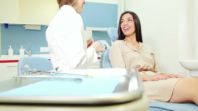 Zoom in of attractive female patient during dental check up