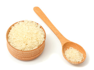 Fototapeta na wymiar rice on wood plate isolated on white background