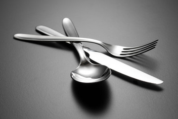 Spoon, knife, fork isolated on white background