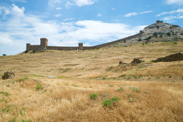 Fototapeta na wymiar Panorama of the Consular castle in the medieval Genoese fortress on a Sunny June day. Sudak, Crimea