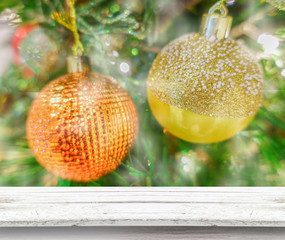 Abstract wooden tabletop with New Year or Christmas background and bokeh light for products or something display.
