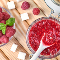 Raspberry jam in a jar. Homemade fruit jam