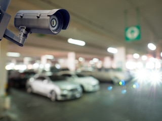 cctv installed on the wall to property car parking