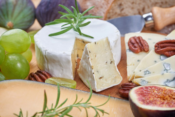 Cheeseboard with blue cheese and fruits