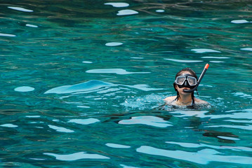 Young woman snorkeling