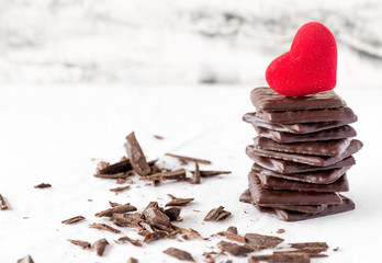 Chocolate candies in the form of hearts. Concept for Valentines day. Design for your postcard of love theme