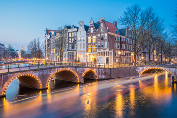 Night view of Amsterdam city skyline at night in Netherlands - obrazy, fototapety, plakaty