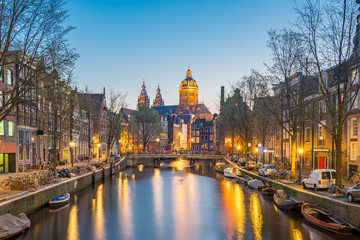 Church of Saint Nicholas in Amsterdam city at night in Netherlands