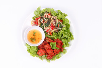 Fried spicy basil with minced pork and curried fish cake.