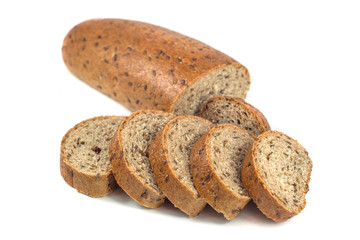 Dark rye bread with seeds on white background