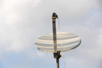 Satellite dish in sunny day