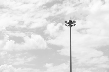 High street searchlight against the sky - black and white