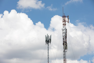 Towers for receiving data on blue sky background