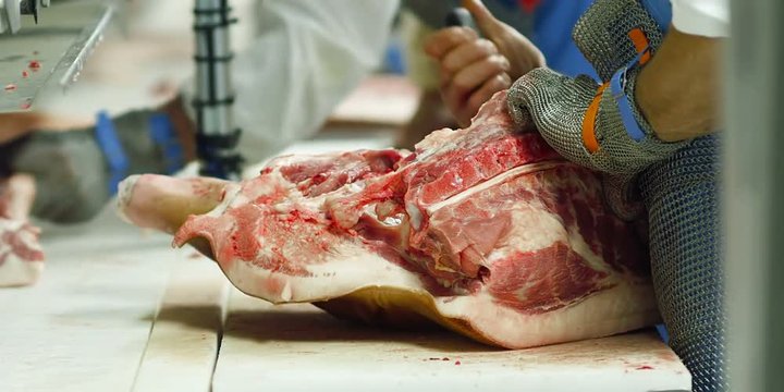 A butcher at a meat factory