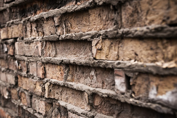 Industrial background, empty grunge urban street with warehouse brick wall
