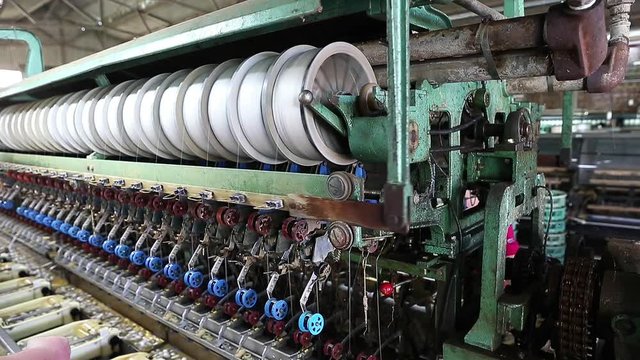 Industrial machinery for the production of silk thread.