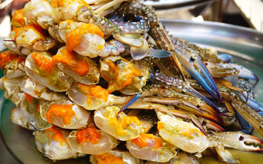 blue crab eggs was arranged on plate for sale on local market