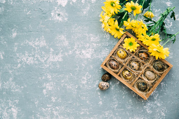 Colored eggs for Easter feast in aged Wooden box
