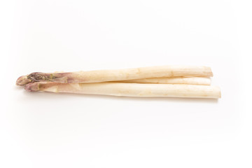 Three white asparagus spears, on white background