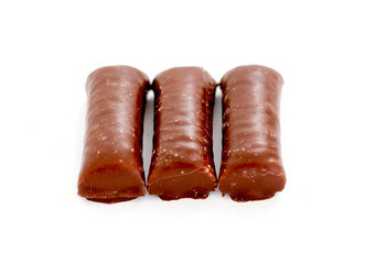 chocolate rolls on white