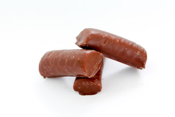 chocolate rolls on white