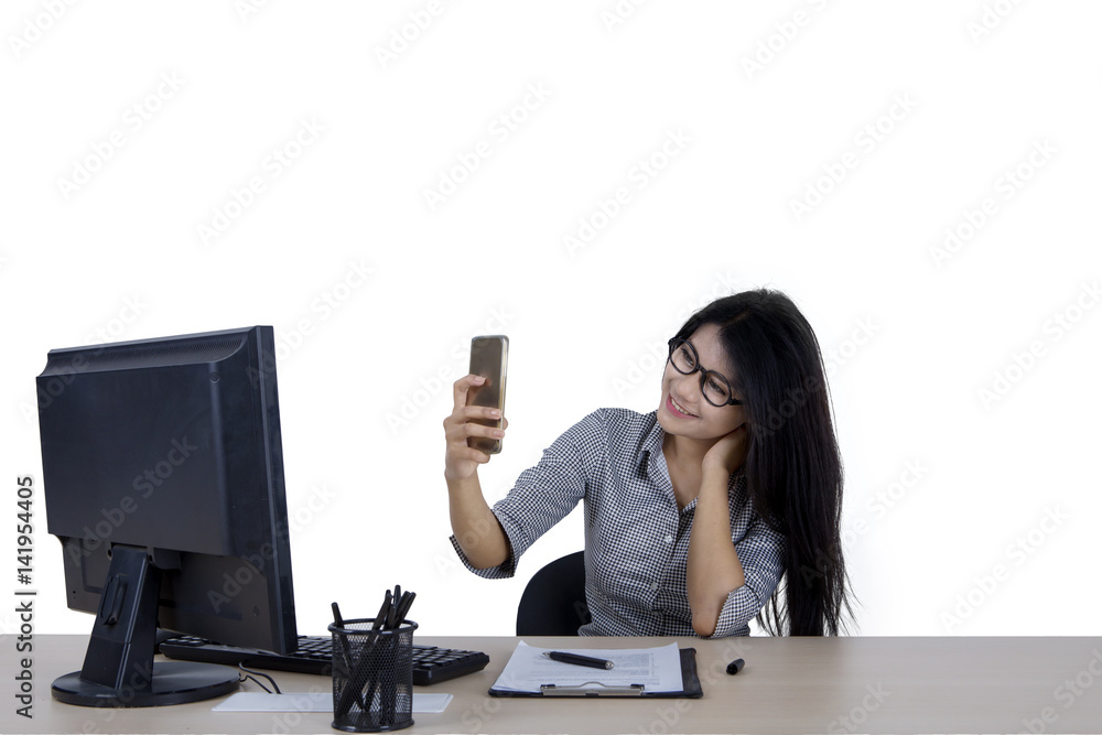 Wall mural Businesswoman taking selfie picture on studio