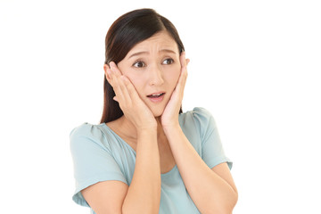 Fototapeta premium 驚いた表情の女性