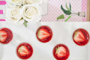 Top view of dessert strawberry with whip cream.