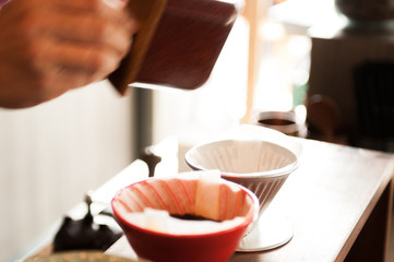 Close-up shot of hand drip coffee. 