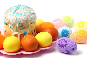 Easter Cake with painted eggs - Russian and Ukrainian Traditional Kulich, Paska Easter Bread isolated on white background