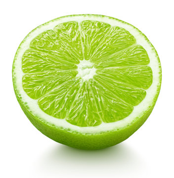 Ripe half of green lime citrus fruit isolated on white background with clipping path