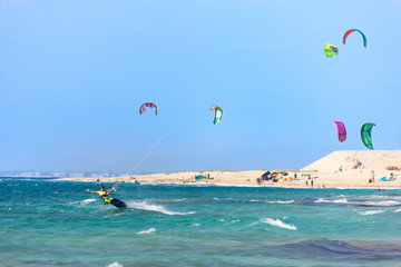 Kitesurfers on the Milos beach in Lefkada island, Greece. © Vladislav Gajic