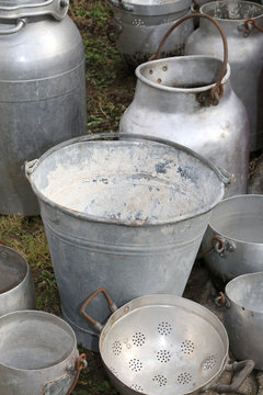 old buckets and other containers in aluminum