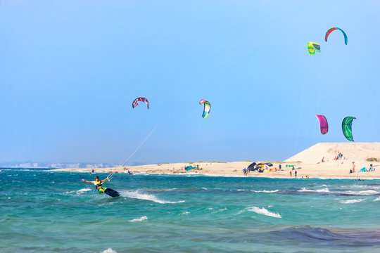 Kitesurfers on the Milos beach in Lefkada island, Greece.