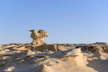 Beautiful Fossil Rock formation in Abu Dhabi Desert. © kingslyg