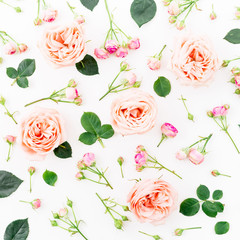 Fototapeta na wymiar Floral pattern with roses, leaves and buds on white background. Flat lay, top view. Floral background. 