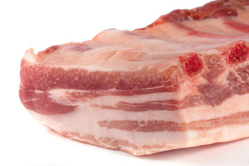 piece of pork isolated on white background close-up