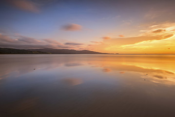 Fototapeta na wymiar Beautiful beach sunset scenery 