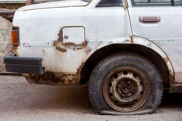 Fototapeta premium Tire leak car wheel.