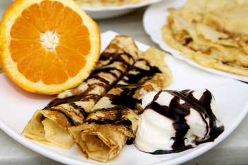 crepes and pancakes freshly made with chocolate and orange