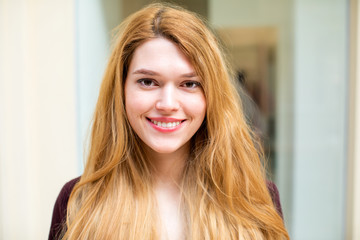 Portrait close up of young beautiful blonde woman