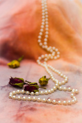 pearl beads and roses buds