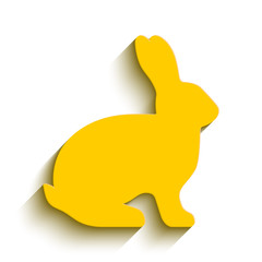 Blank yellow flat side silhouette of a rabbit with long shadow isolated on white background. Vector illustration. EPS10