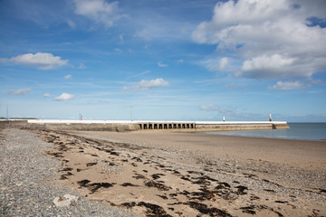 Sandy Beach and breakwater at Ramsey Isle of Man