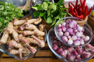 Tom Yam Kung ingredients, red onions, chili, galangal, kaffir lime, parsley