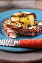 Grilled Seafood Octopus on Saffron Risotto with Brown Shimeji Mushrooms